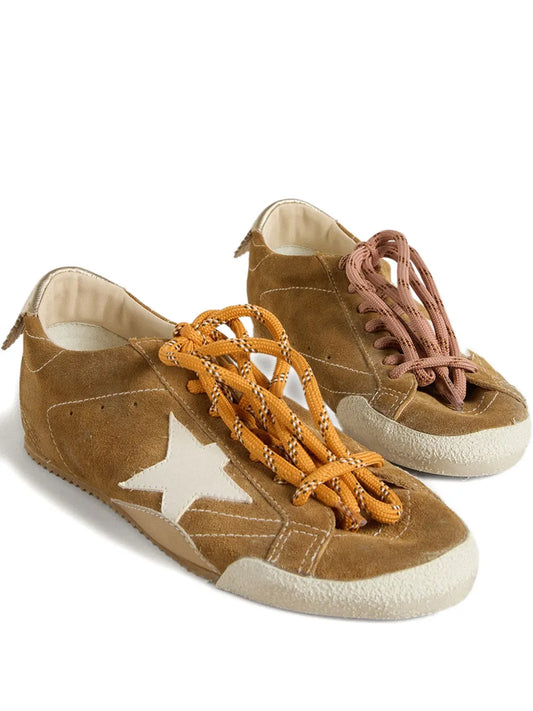 True-Star in tobacco-colored suede with white star and platinum heel tab