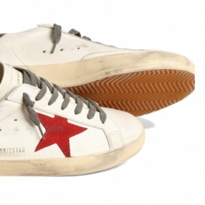 Golden Goose Super-Star with red suede star and green leather heel tab