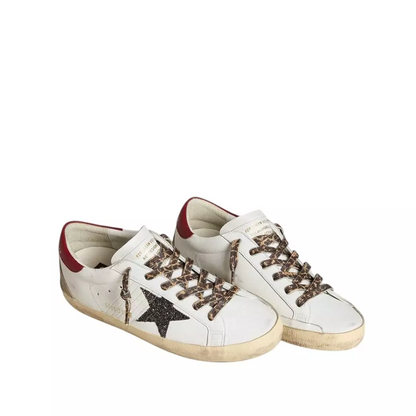 Golden Goose Super-Star in nappa with glitter star and red nappa heel tab